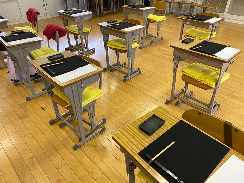The tables are ready and arranged with the necessary materials for calligraphy